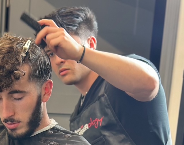 Scissor-over-comb haircut